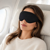 Comfy Cloud Sleep Mask with silicone earplugs; contoured sleep mask showing raised eye cups; Comfy Cloud blackout sleep mask viewed from the front; adjustable elastic strap on Comfy Cloud Sleep Mask; ventilated contoured sleep mask for travel; soft silicone loop-style earplugs beside sleep mask; Comfy Cloud Sleep Mask packed for air travel; lightweight sleep mask worn while resting