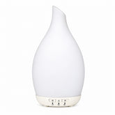 Greta Ultrasonic Diffuser with blown glass cover Essential oil diffuser with multi-coloured LED light 150 ml ultrasonic diffuser Blown glass aromatherapy diffuser Greta diffuser with LED lighting Ultrasonic essential oil diffuser on tabletop Decorative glass diffuser with timer settings
USB-powered Greta Ultrasonic Diffuser