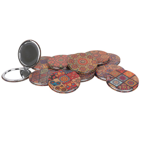 Compact makeup mirror with paisley design Travel makeup mirror with 1x and 2x magnification Pocket mirror with mosaic pattern Compact cosmetic mirror for purse Assorted paisley compact mirror Beauty mirror for travel bag