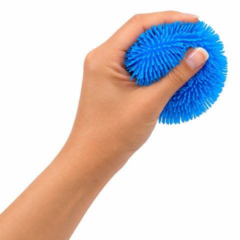Squiggles Fidget Sensory Toy in assorted colours; squishy TPR sensory toy held in hand; orange Squiggles Fidget sensory toy; purple squishy fidget toy; colourful sensory squeeze toy with maltose filling; Squiggles Fidget being squeezed by hand; assorted Squiggles sensory toys in bright colours; 7.5 cm squishy sensory fidget toy
