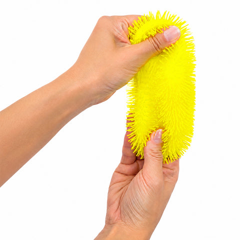 Squiggles Fidget Sensory Toy in assorted colours; squishy TPR sensory toy held in hand; orange Squiggles Fidget sensory toy; purple squishy fidget toy; colourful sensory squeeze toy with maltose filling; Squiggles Fidget being squeezed by hand; assorted Squiggles sensory toys in bright colours; 7.5 cm squishy sensory fidget toy