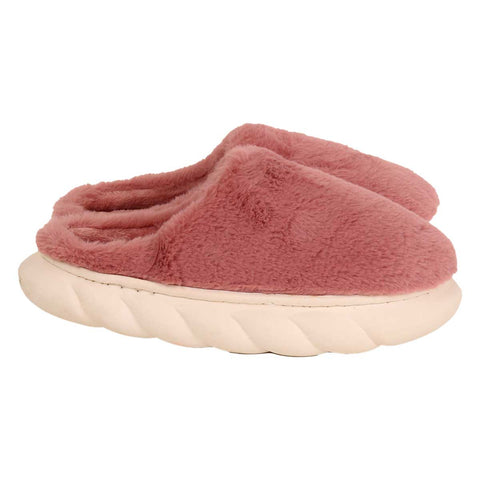 Women's COZY'Z Slippers viewed from above; plush women's house slippers with thick soles; side view of extra-thick EVA slipper sole; fuzzy COZY'Z Slippers worn indoors; lightweight women's slippers beside a chair; anti-slip EVA outsole on women's slippers; soft polyester COZY'Z Slippers for home; women's slippers in sizes 7 through 10