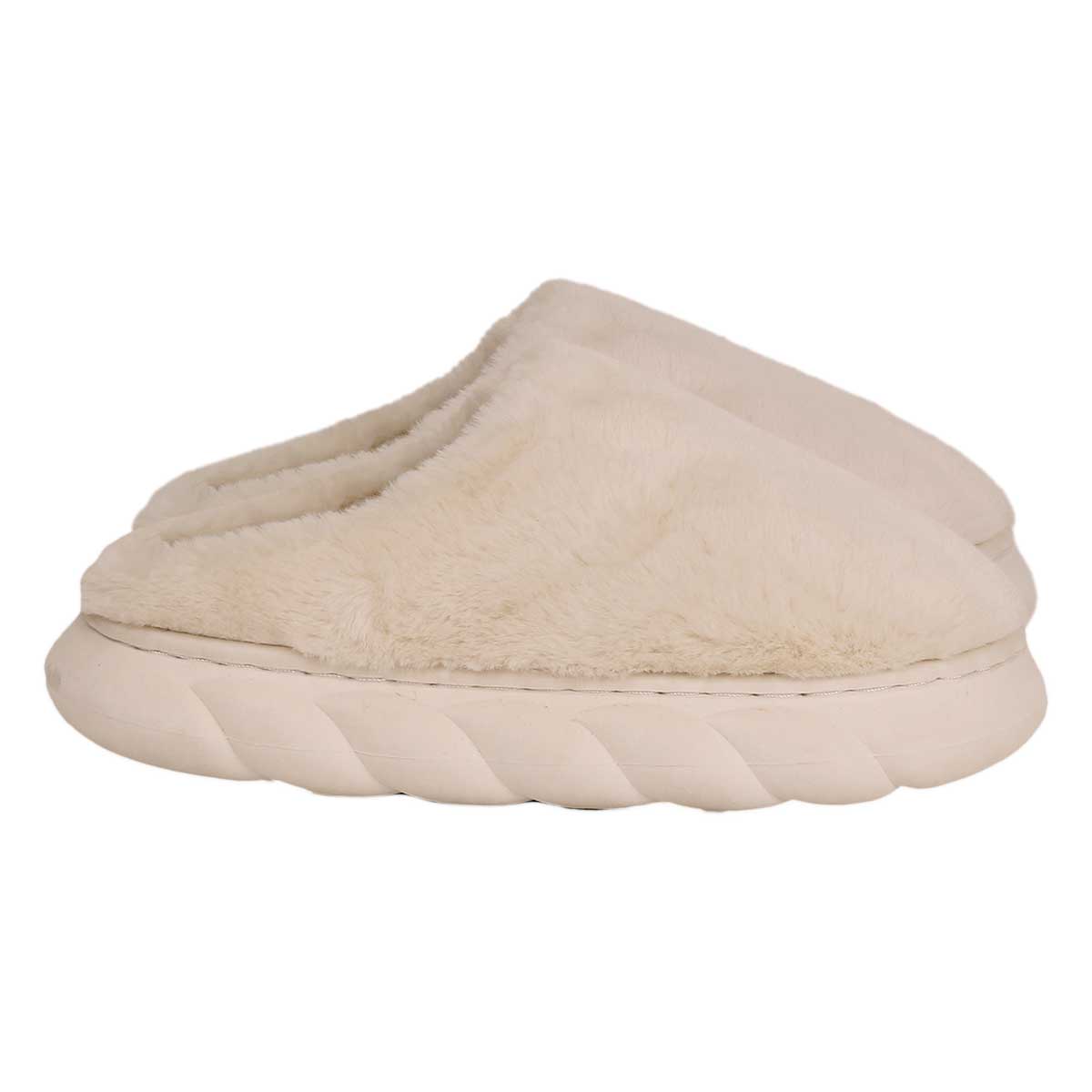 Women's COZY'Z Slippers viewed from above; plush women's house slippers with thick soles; side view of extra-thick EVA slipper sole; fuzzy COZY'Z Slippers worn indoors; lightweight women's slippers beside a chair; anti-slip EVA outsole on women's slippers; soft polyester COZY'Z Slippers for home; women's slippers in sizes 7 through 10