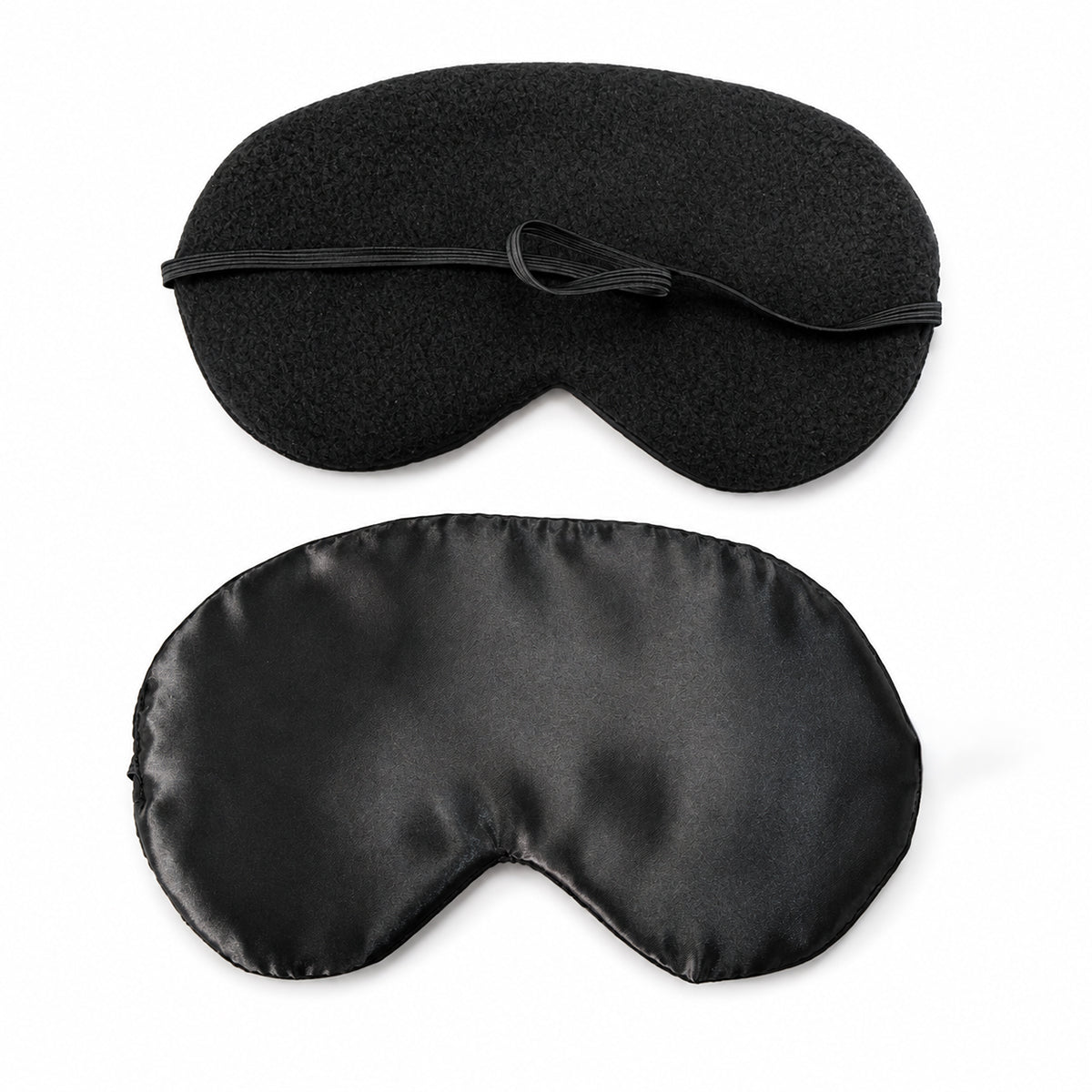 Sleep Mask with included earplugs; soft lightweight Sleep Mask viewed from the front; Sleep Mask laid flat beside earplugs; lightweight sleep mask packed for travel; Sleep Mask and earplugs with travel essentials; soft sleep mask for home or travel