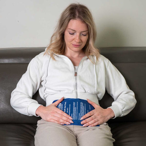 Woman using Relaxus Hot & Cold Gel Pack