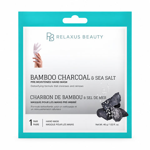 Bamboo charcoal and sea salt hand mask pouch; pre-moistened hand mask treatment; glove-style bamboo charcoal hand mask; sea salt hand mask for a 30-minute routine; hand mask removed from its pouch; bamboo charcoal hand-care mask packaging; hands wearing a pre-moistened glove-style mask; single-use charcoal and sea salt hand mask.  
 